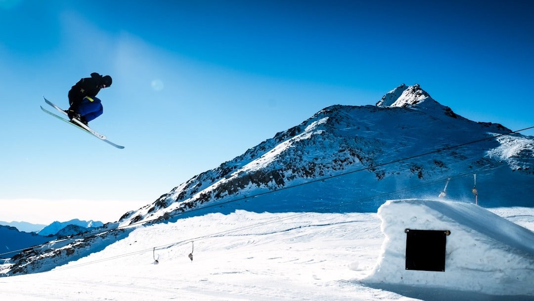 about-05 man-snow-skiing-near-mountain-f2gtqrawq3k